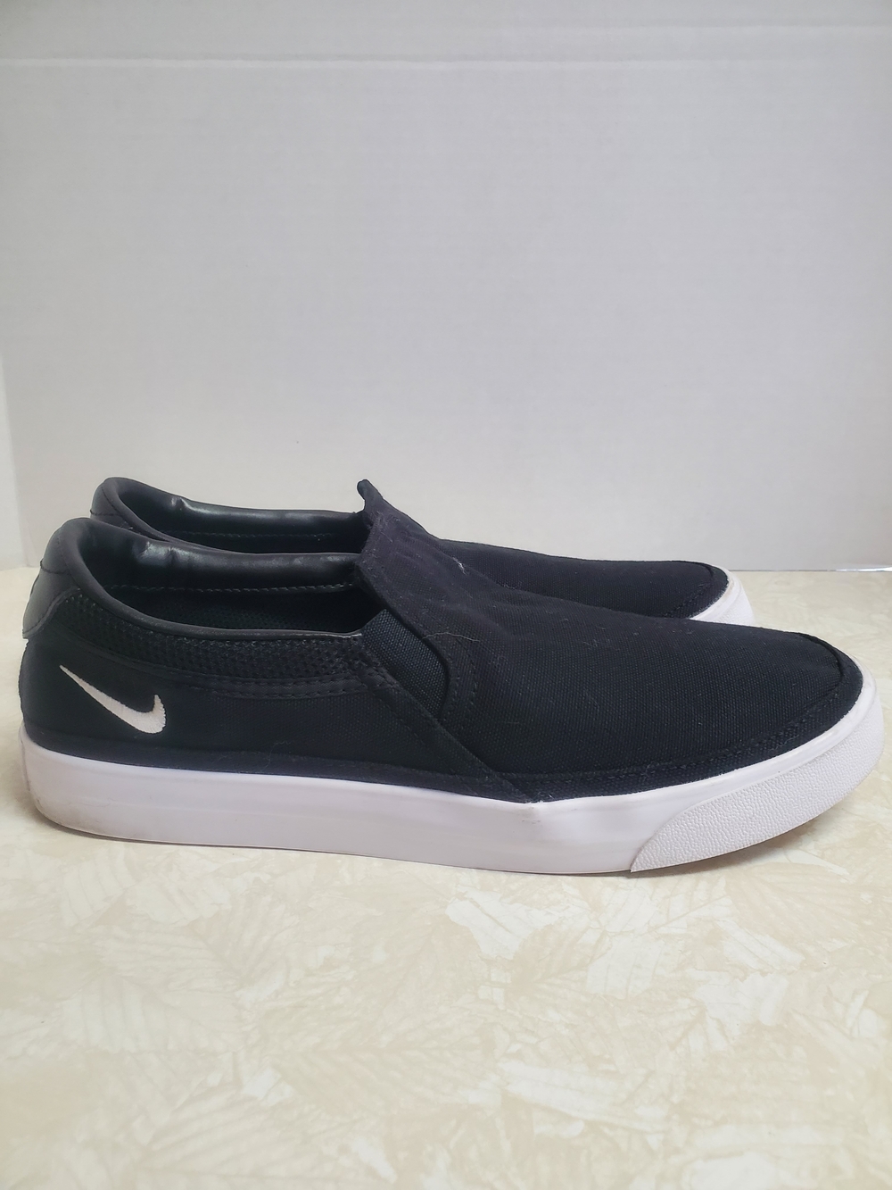 Nike  Court Legacy Black Slip-On Canvas Loafers with White Swoosh